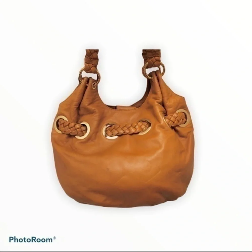 Michael kors brown leather grommet tassel bag